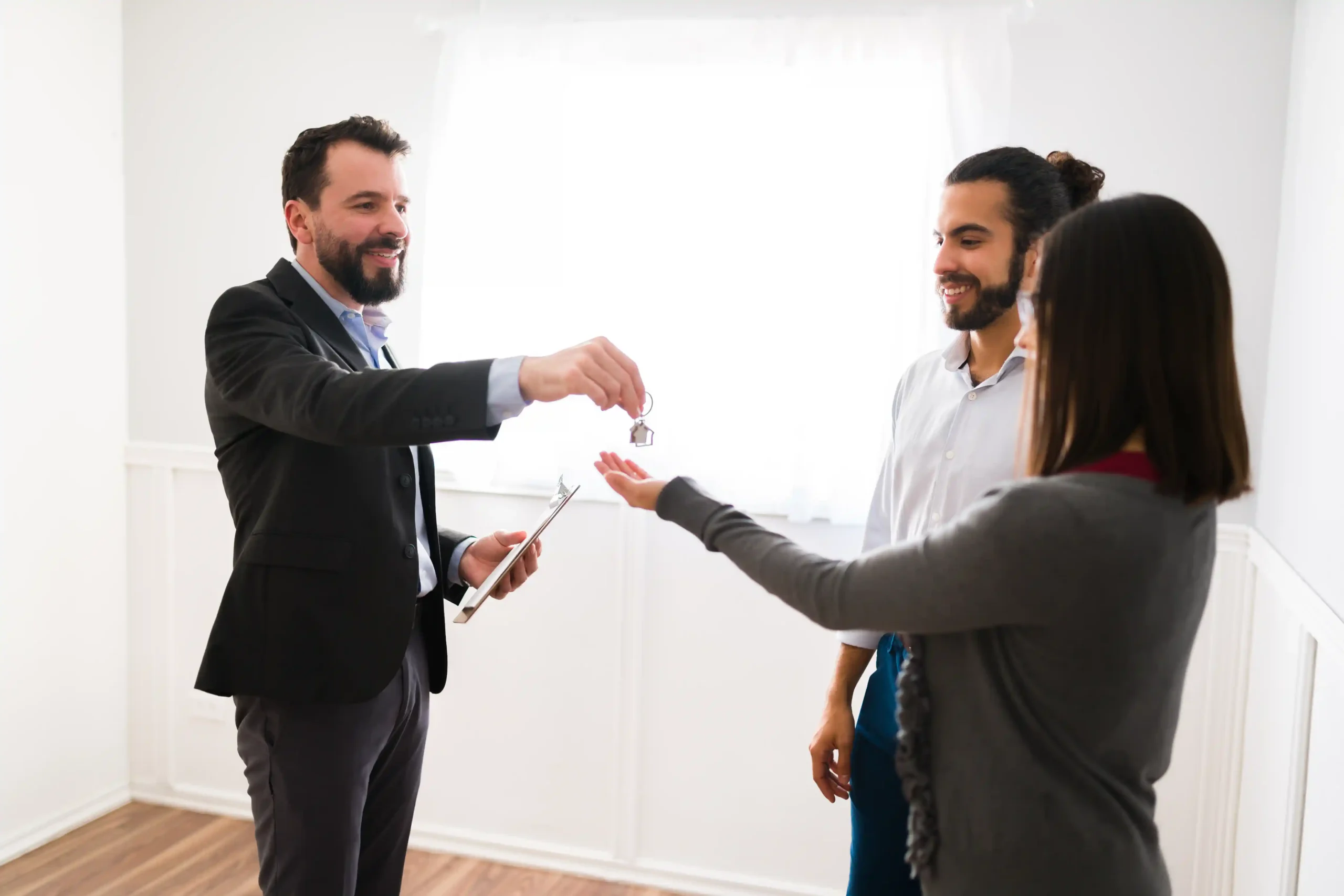 Airbnb host welcoming guests to a holiday rental apartment
